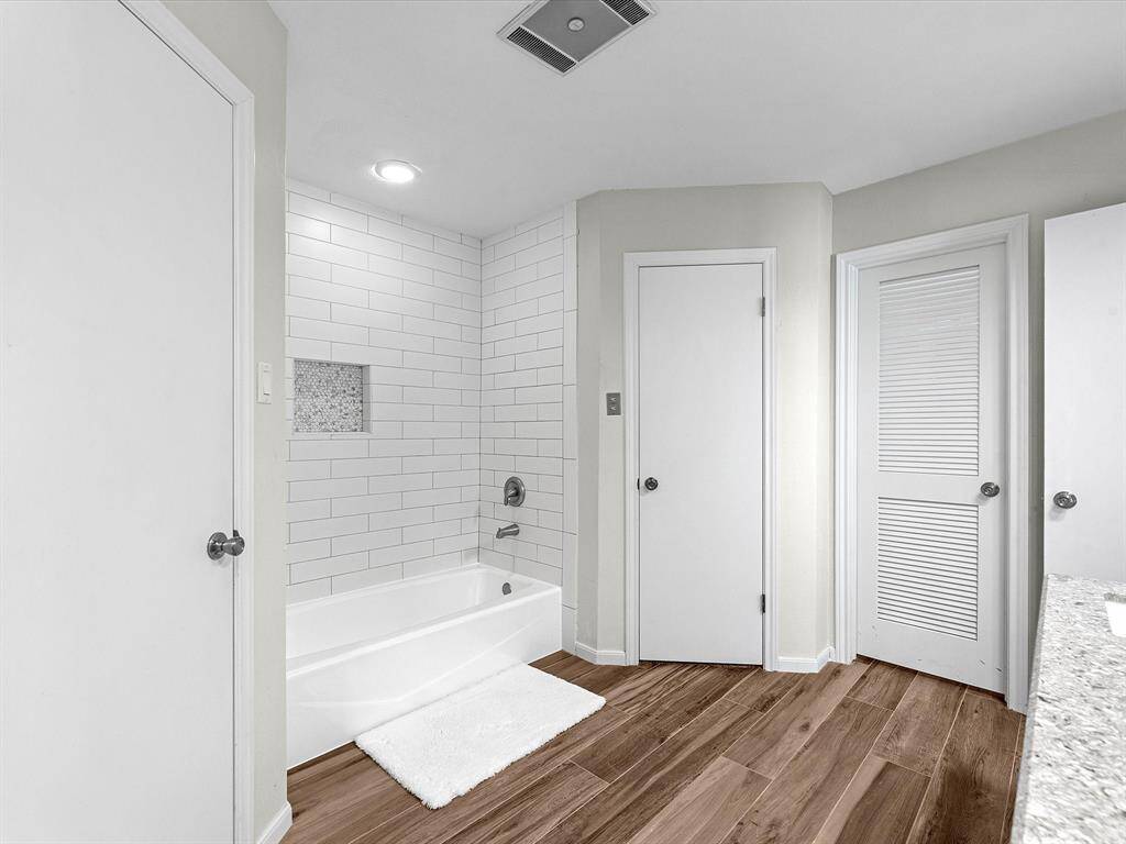 2nd Primary Suite bathroom renovated Oct 2024 with tub and separate shower