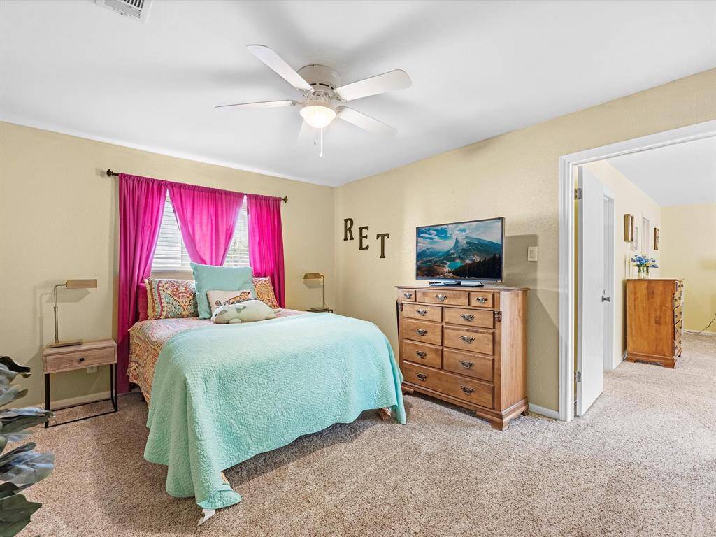 Secondary bedroom (1 of 2) with walk-in  closet - located off 2nd Primary Suite… (perfect for Mother-in-Law Suite with a private den, a Nursery w/live-in Nanny, or simply a bedroom as shown)