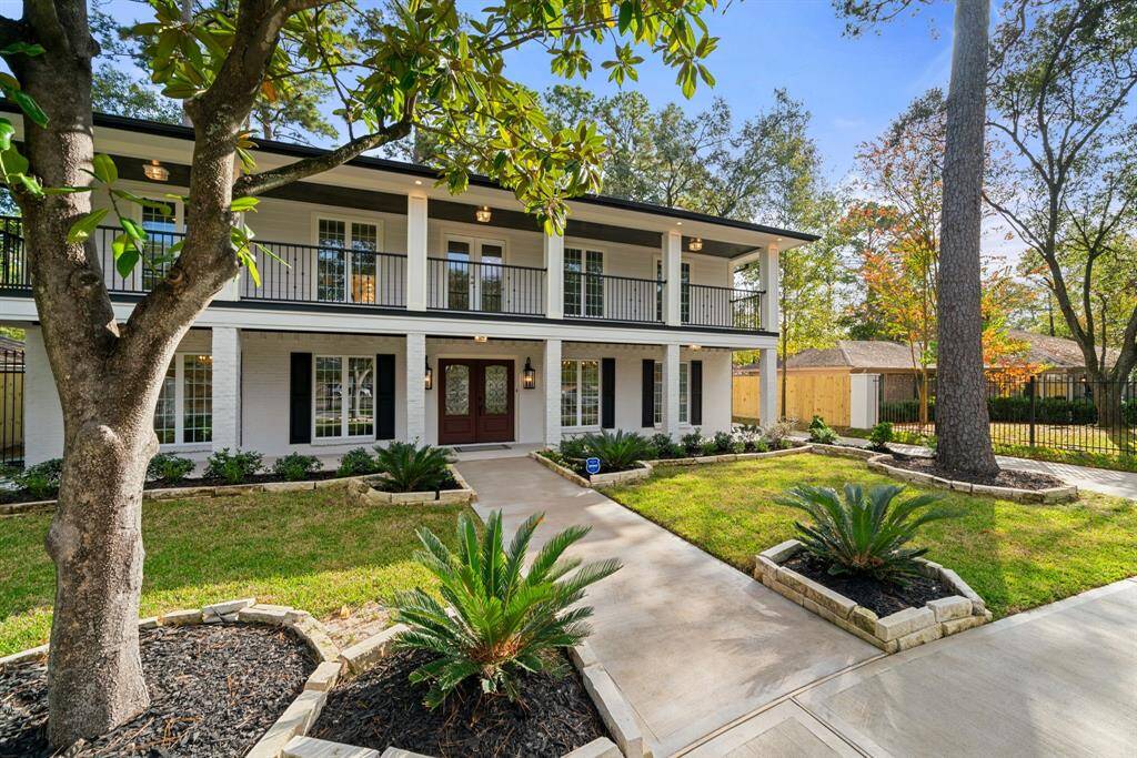 Convenient Circular Driveway within Private Wrought Iron Solar Powered Gate