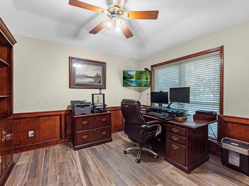 Office located in front of the house off the dining room