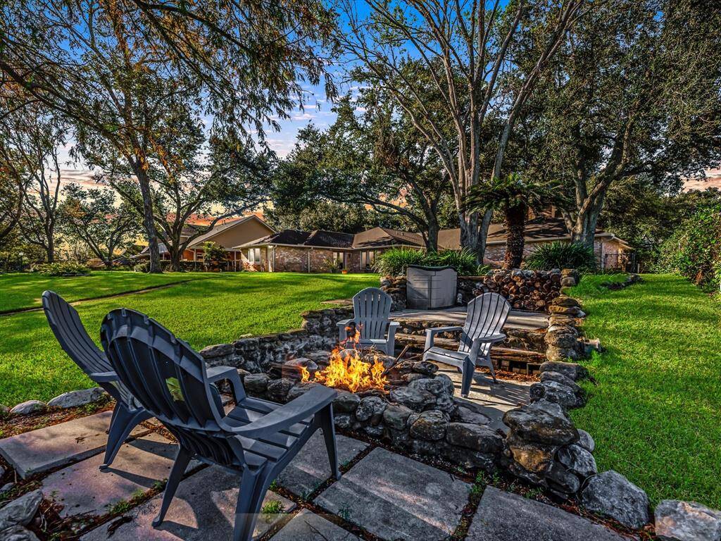 Custom outdoor Fire Pit with Custom Log Storage Stand