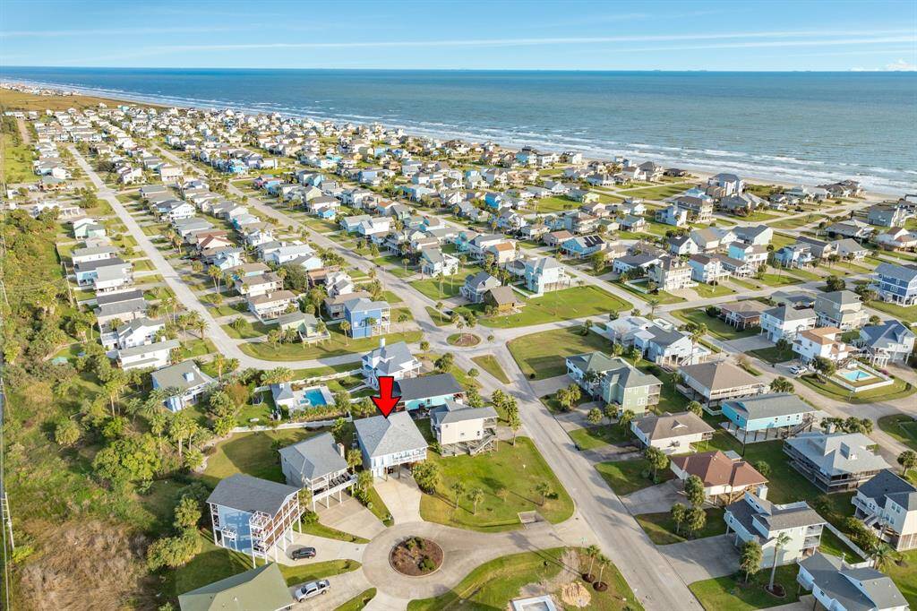 Aerial view looking towards the east. Short golf cart ride to the beach!