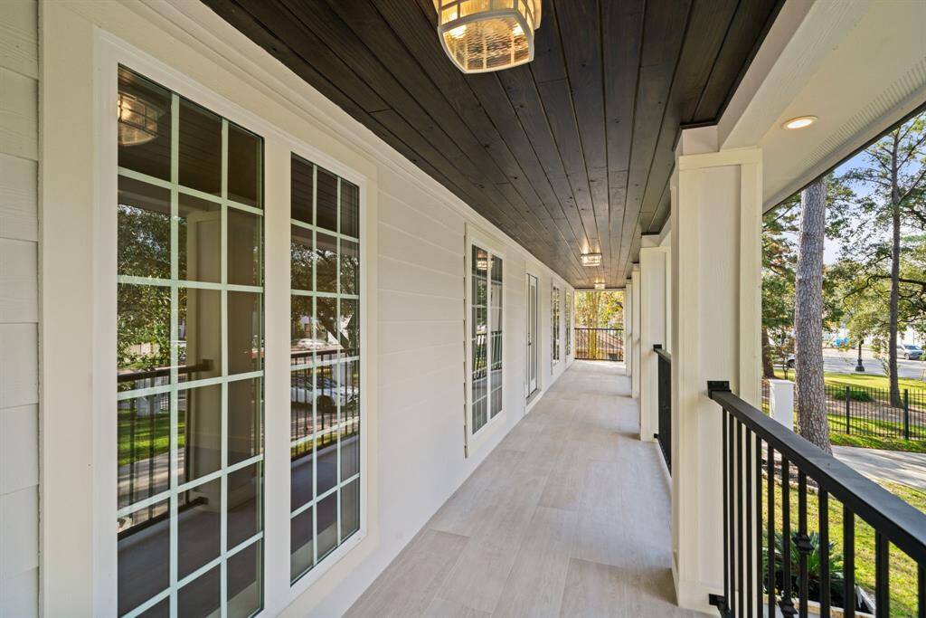 Second Floor Patio overlooks the Beautiful Front Landscape