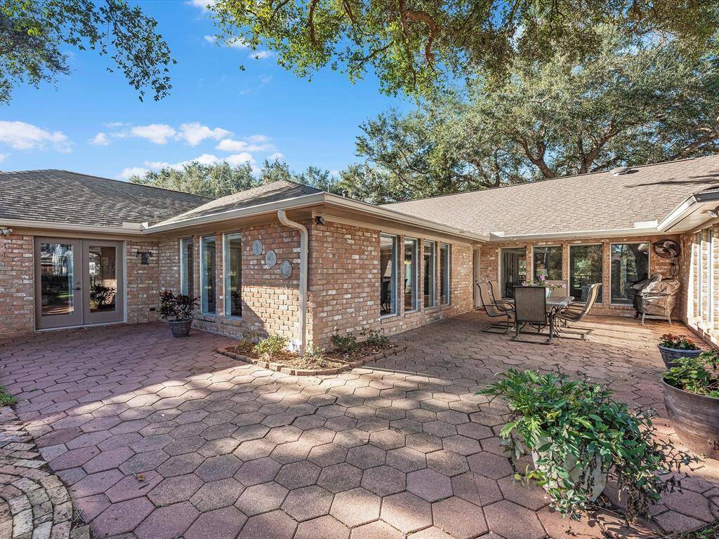 Private Patio off Main Primary Suite and Extended Patio off Kitchen - Entertaining options are endless