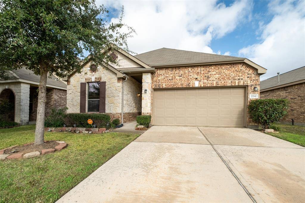 Spacious two-car garage for convenience and ample storage.