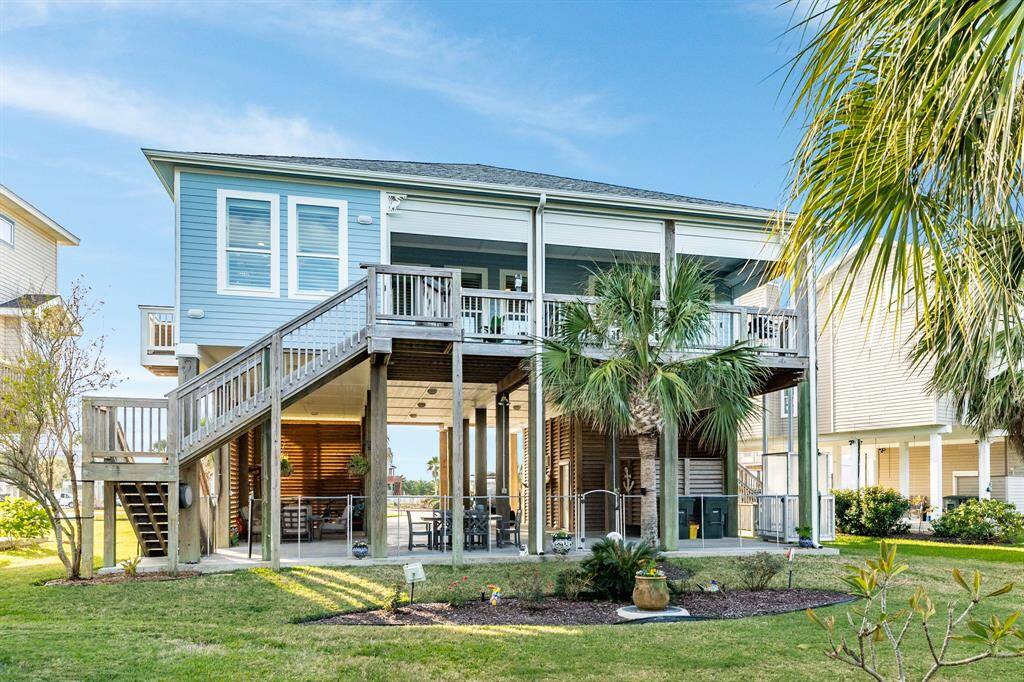 This is a view of the east elevation of the home, In addition to the staircase leading up to the main deck & front entrance, there is also a Legacy Lift with rain enclosure.