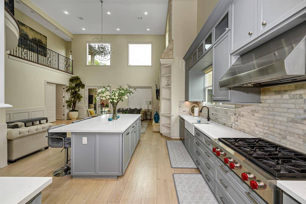 The kitchen is  a showpiece of both functionality and design, with high end appliances and custom cabinetry