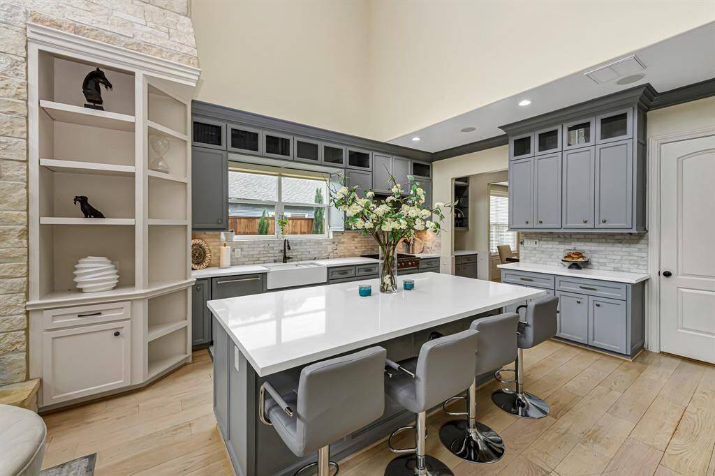 This kitchen is a chef's dream.  Plenty of storage and workspace and tons of natural light