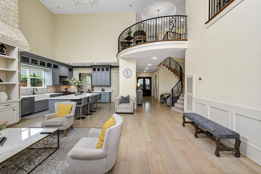 The spiral staircase is a dramatic architectural feature that combines elegance and artistry, drawing the eye upward as it twists gracefully toward the upper levels