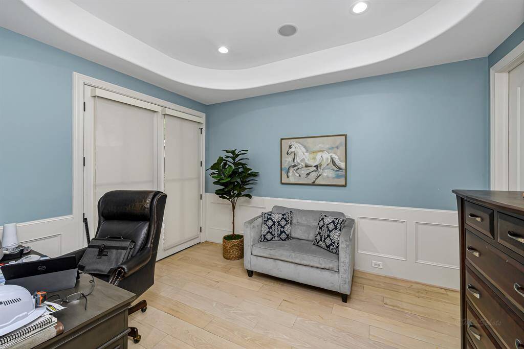 Home office located immediately to the left of the home upon entering is the ideal spot to work from home, with French doors to the front porch you can let the sunlight in or take a little break to get some vitamin D