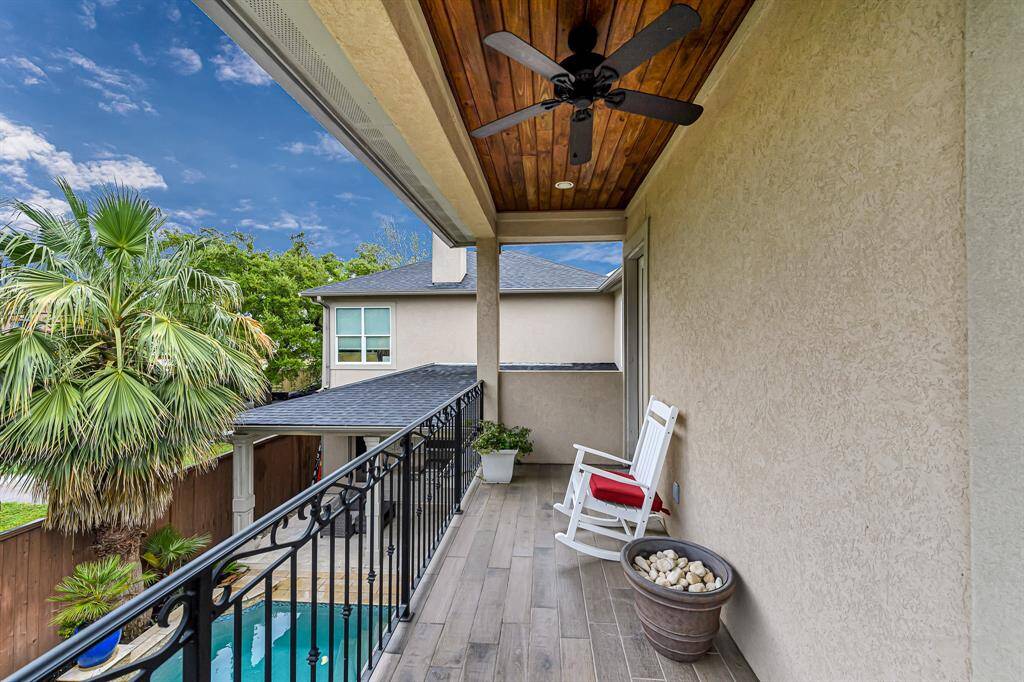 Balcony overlooking the beautifully landscaped backyard and pool is the perfect spot to enjoy your morning coffee