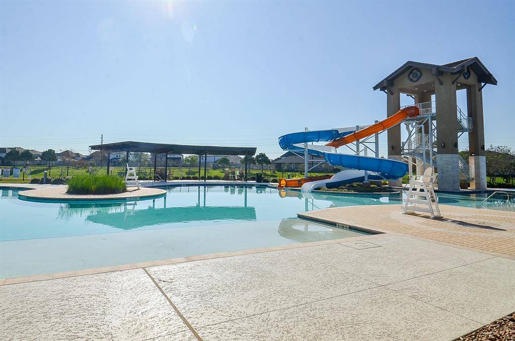 Amazing amenities include resort style pool, splashpad, fitness center, sports fields, lakes & walking trails