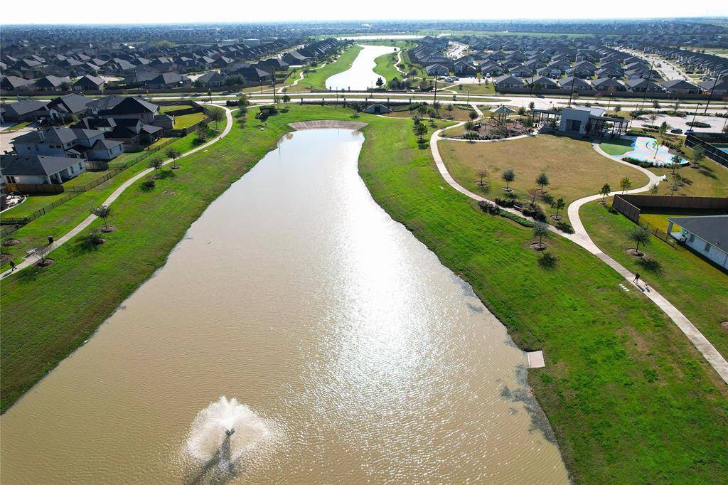 The master plan for the community dedicates 100 acres to green spaces.