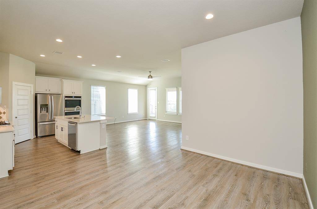 Dining is open to Kitchen and Living Areas