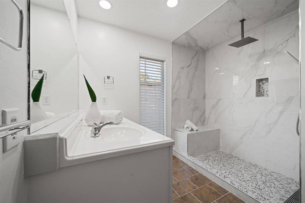 Master Bathroom features Premium Marble Shower & Dual Vanity Sinks