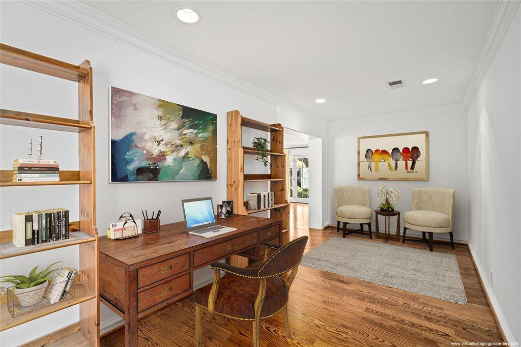Back hallway leads to the garage and utility.  with plenty of room for homework desks/or home office. Multi-point divided light doors to the side patio & yard.  Landscaped gravel side yard for easy maintenance.