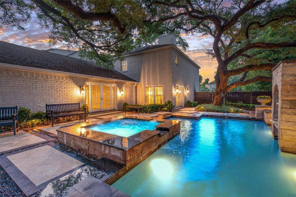 Custom designed hardscapes define the space.  Think of the fabulous pool parties you can have in this back yard!