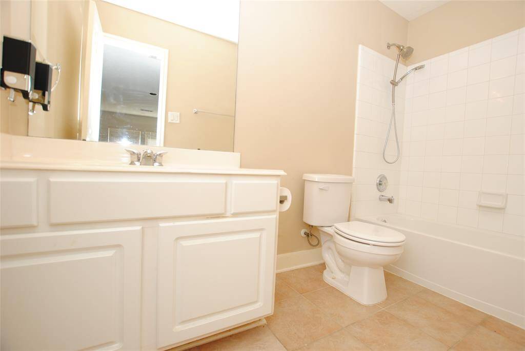 one of the two full bathrooms upstairs