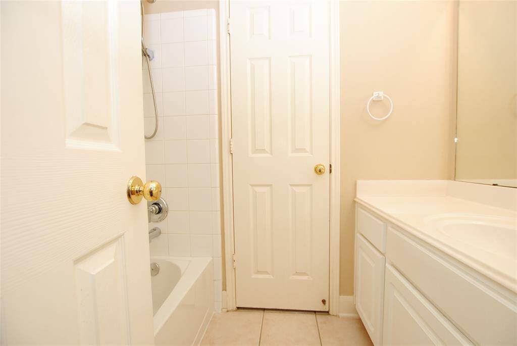 one of the two full bathrooms upstairs