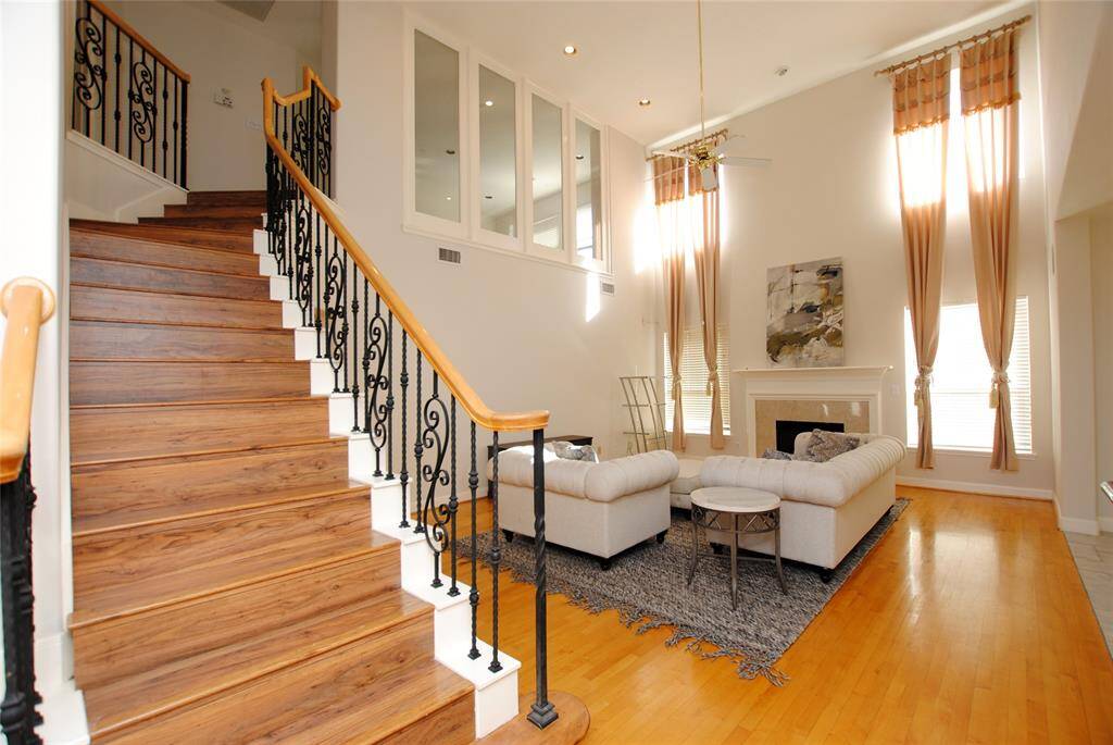 High ceiling family room with big south facing windows