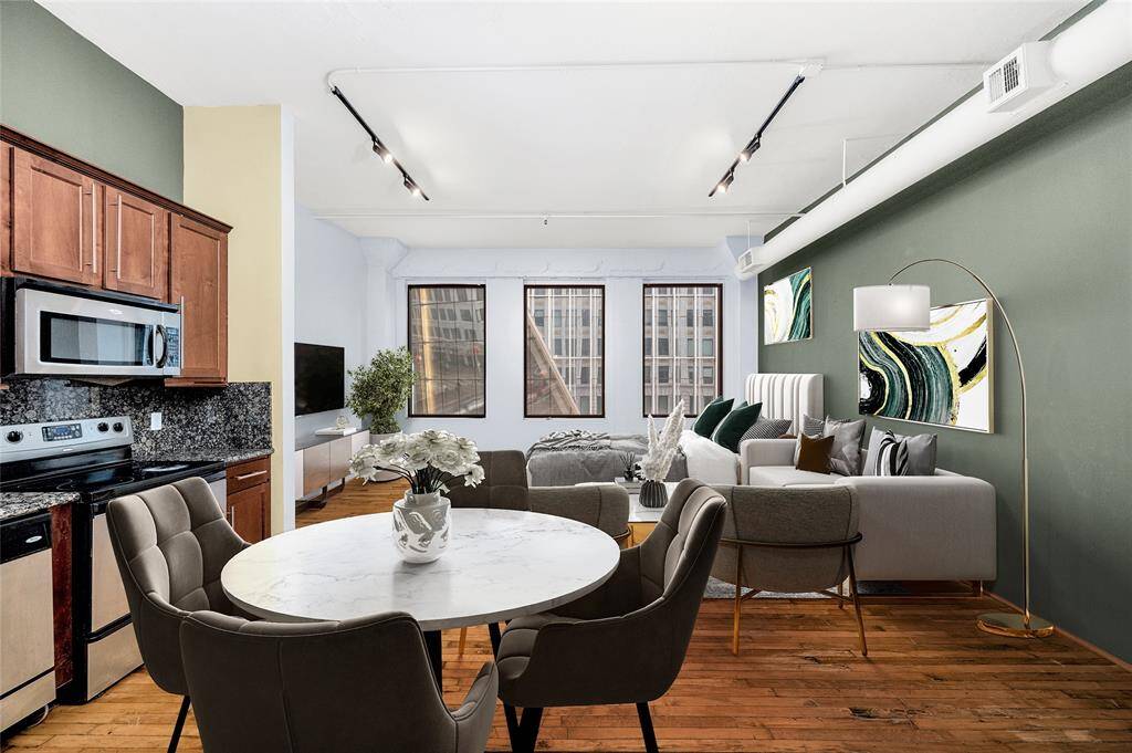 Delightful Studio/Efficiency unit in heart of Downtown! Perfect for the urban dweller or for a pied-a-terre! Large open Living/Dining/Bedroom/Kitchen makes for flexible furniture placement and offers plenty of space for both living and sleeping areas. 3 large windows overlook Capitol Street! PHOTO VIRTUALLY STAGED.