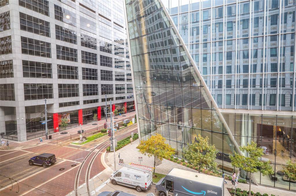 The view from St Germain offers the intersection on Main & Capitol Streets. MetroRail runs on both streets connecting you to various areas of the city! Note you can see reflection of historic St Germain Lofts in the glass of the modern skyscraper across the street!