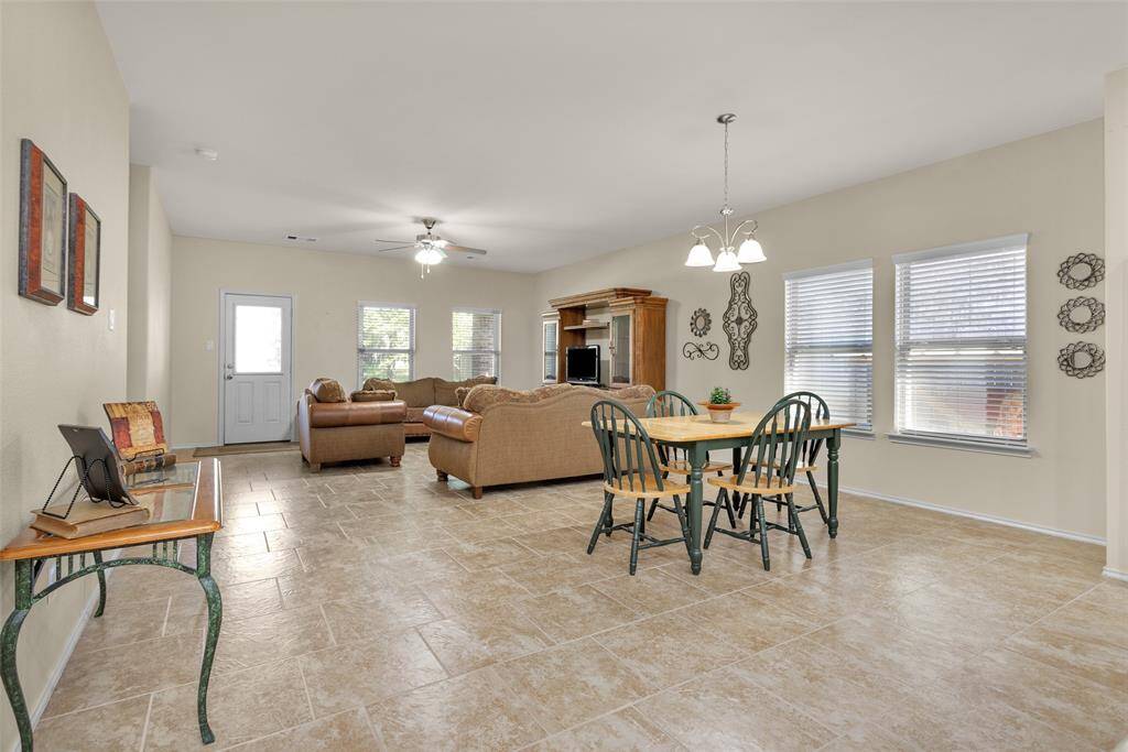 Breakfast & family room just off the kitchen. All tile flooring for easy care.