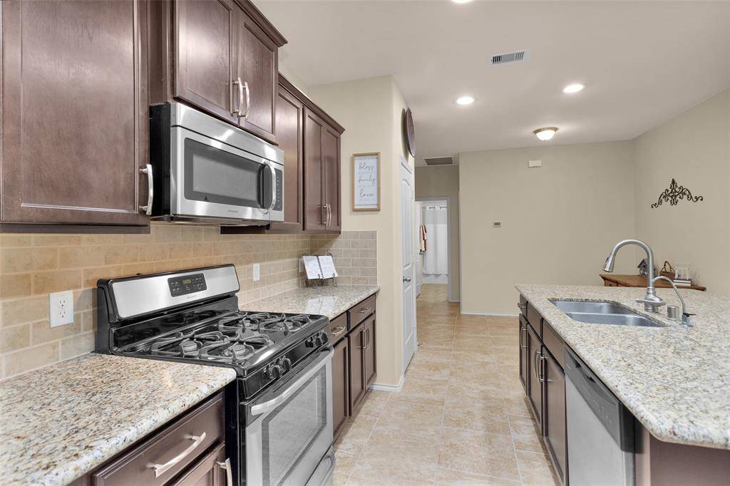 Kitchen offers gas cooking.