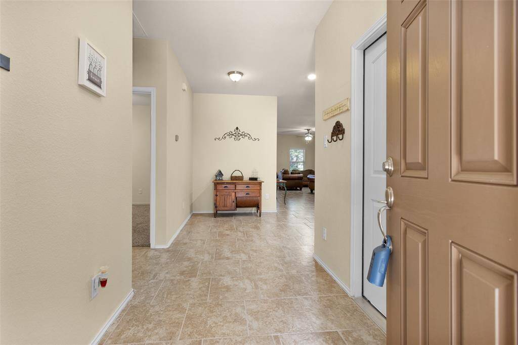 Entryway with garage access to your right.