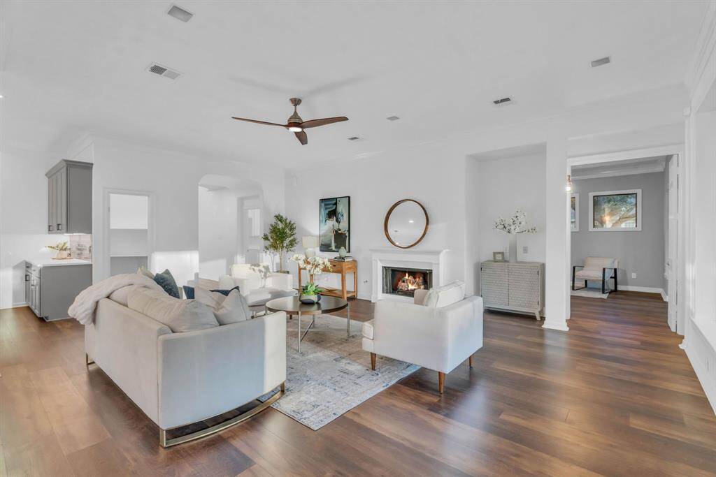 To the left of the couch, you'll find an additional storage room—a versatile space perfect for stashing toys, games, or even using it as an extra pantry. Its practicality adds to the home's thoughtful design, keeping everything organized and easily accessible.
