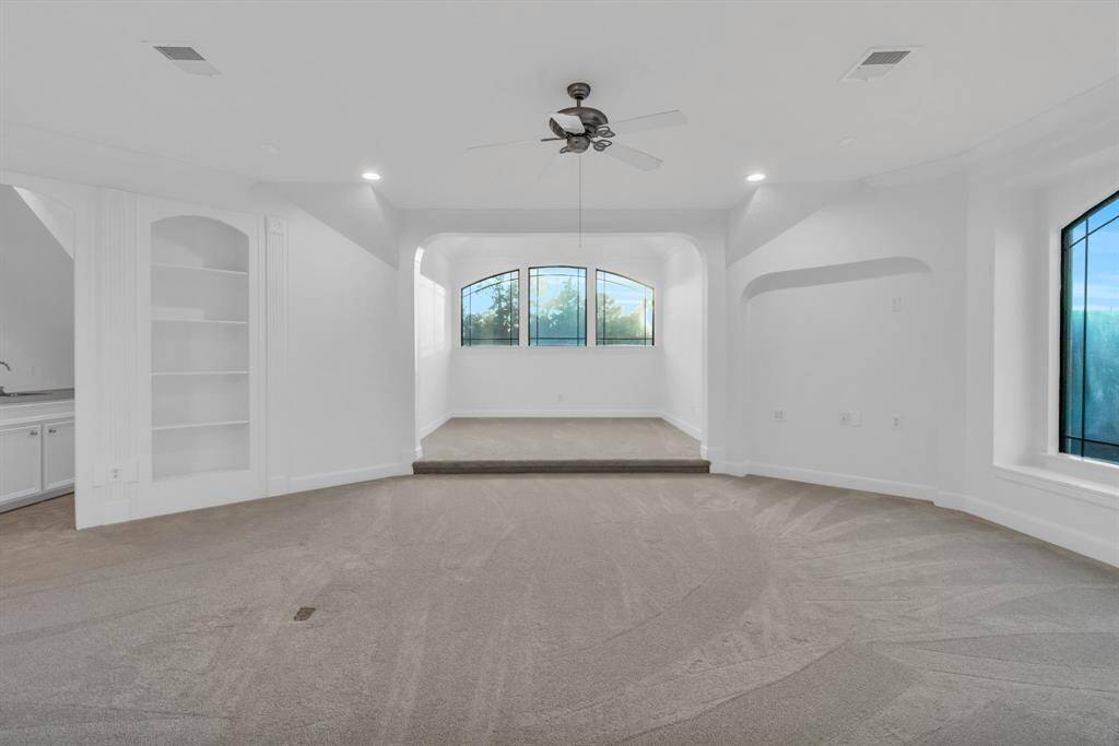 The game room and all of the upstairs have been upgraded with brand-new carpet as of November 2024, adding comfort and a fresh, inviting feel to the entire upper level.