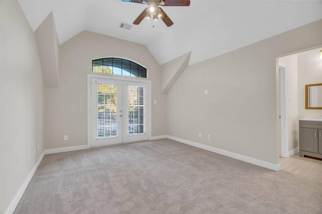 Secondary bedroom with balcony, huge walk in closet and updated Jack and Jill bathroom.