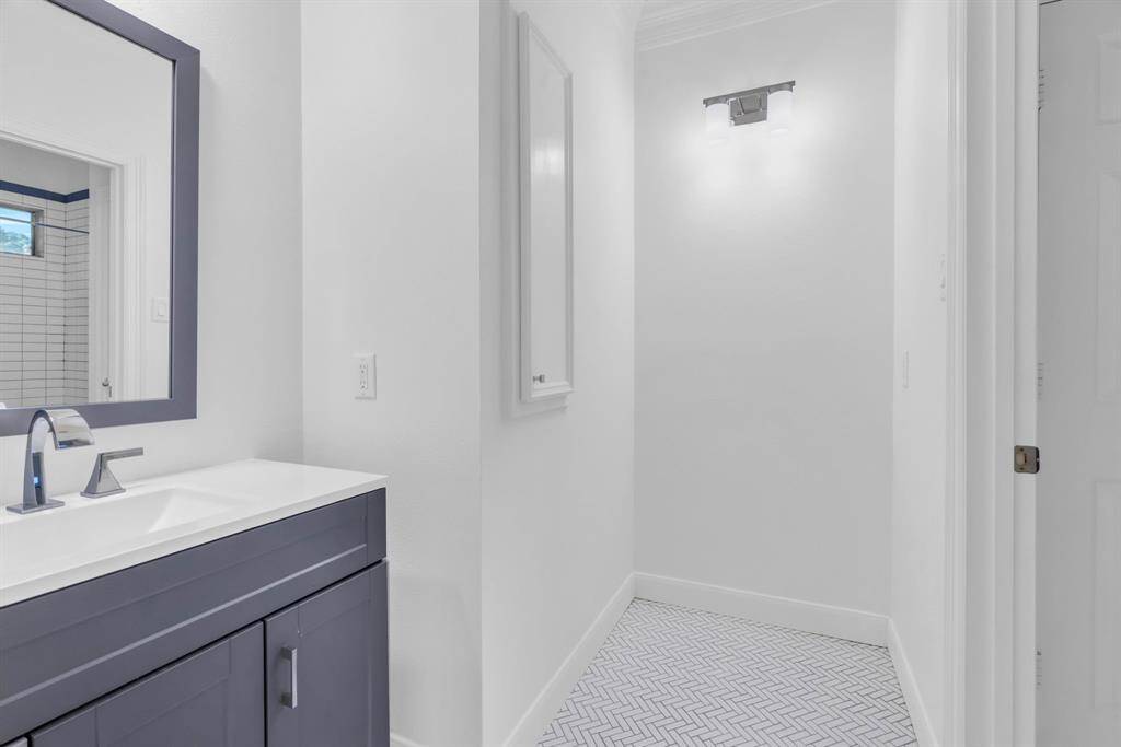 The second vanity and extra space perfect for additional shelving.