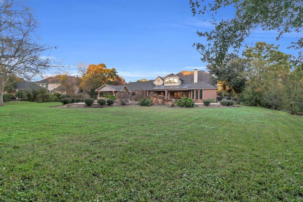 This view you can see how large and private the lot is! Plenty of room for kids and pets to run and play!