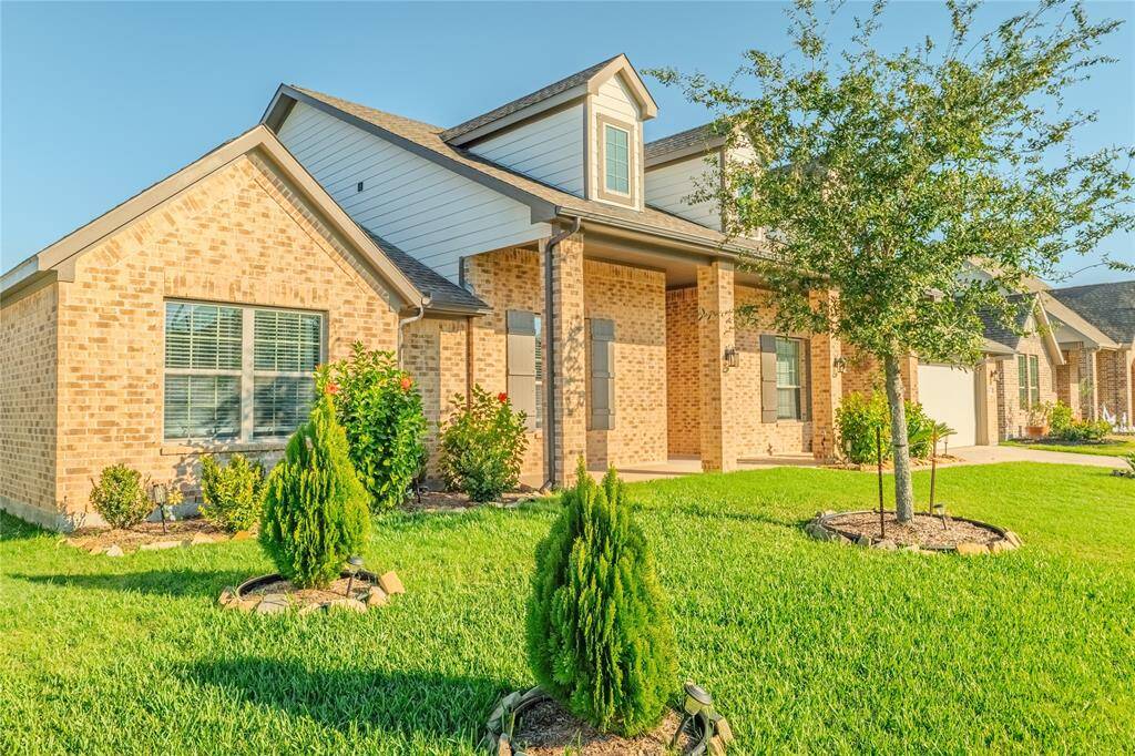 Showcasing exceptional design, this picturesque home features a sophisticated brick façade framed by vibrant landscaping and striking dormer windows. Located near the front of the neighborhood, this home offers easy access to main roads and community amenities.