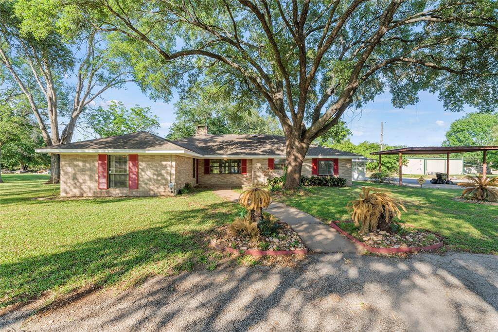 Large one story home has 2850 sq ft with addition of a converted back patio and garage space.