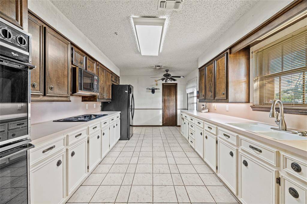 Anther view of the kitchen. Notice the window over the sink!