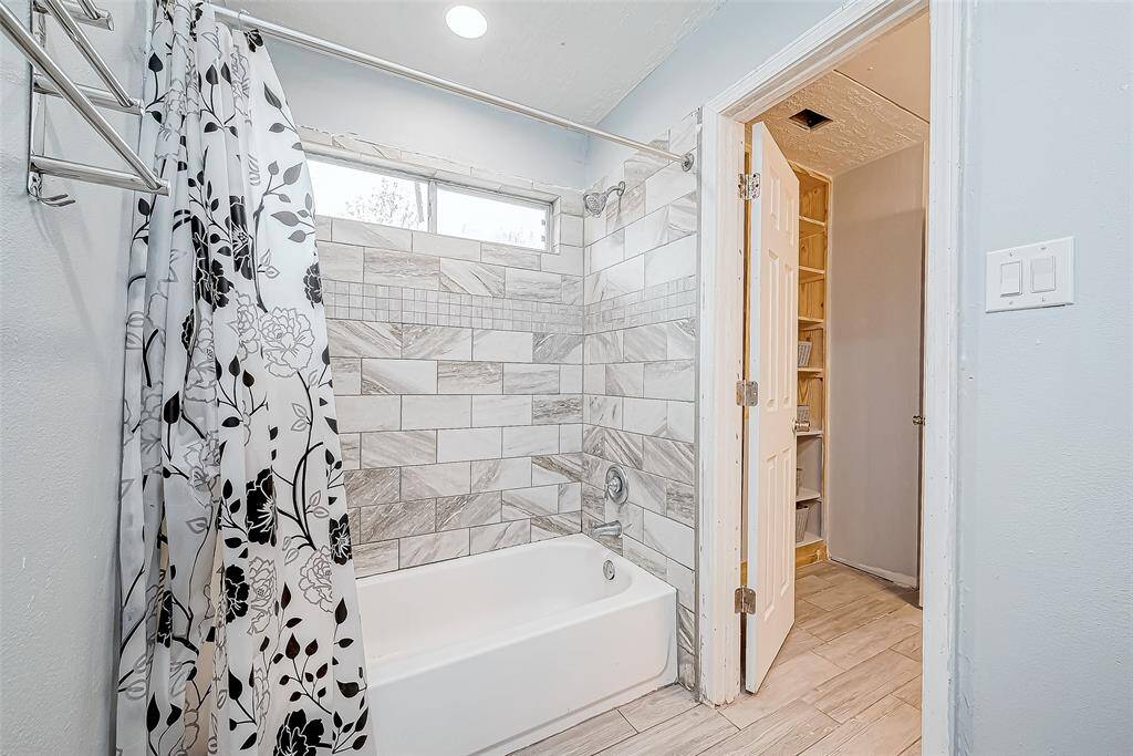 Upstairs bathroom located at the top of the stairs.