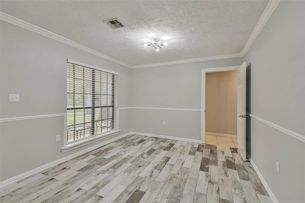 Area to the left of the entry was. Can be used as a large dining room or office area.
