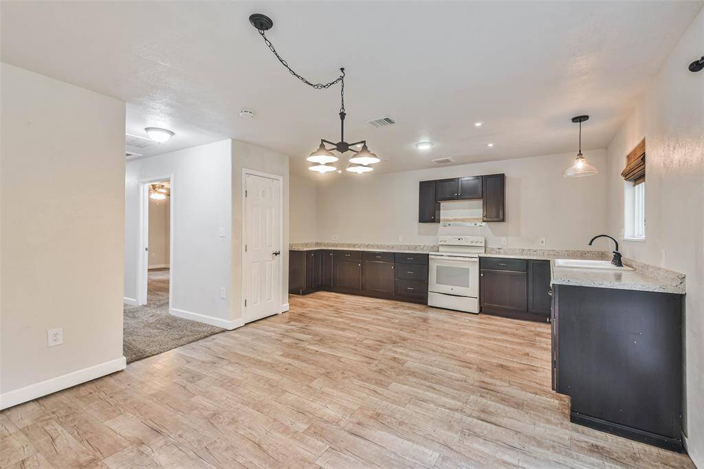 View of kitchen and dining area.