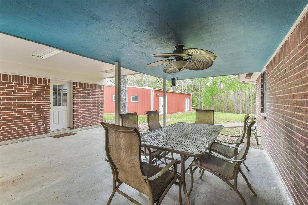 Porch area between house, breezeway and garage.