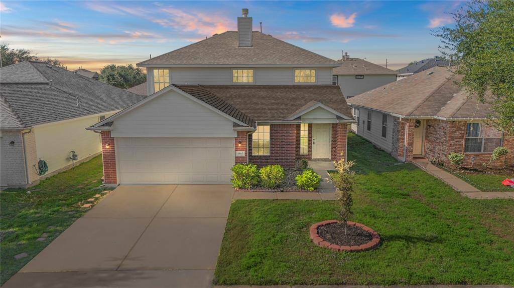 Welcome home to 6547 Holly Cove Lane in the Strathmore community in Katy!