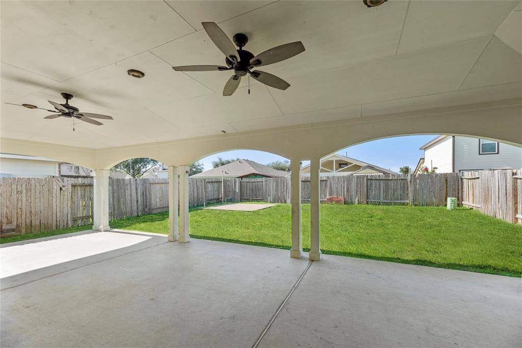 This amazing back porch covers the full back of the home!
