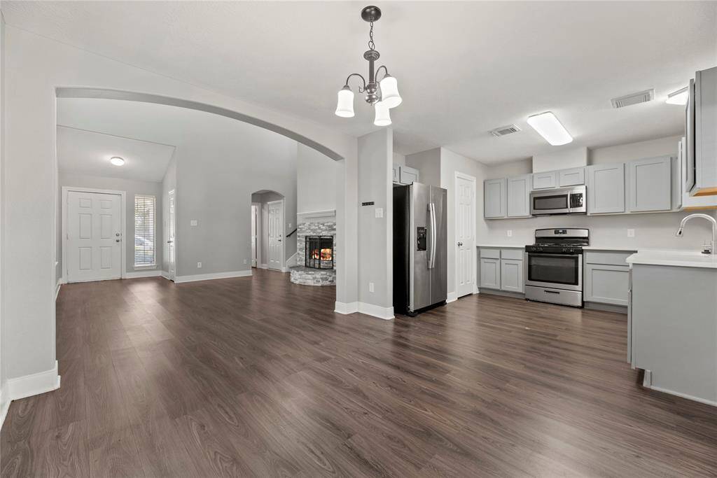 In this open concept design, the kitchen serves as the heart of the home, where meals are prepared, conversations flow, and memories are made.