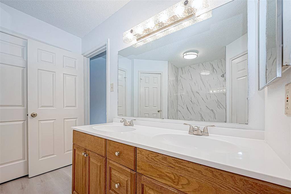 Large storage closet in primary bath