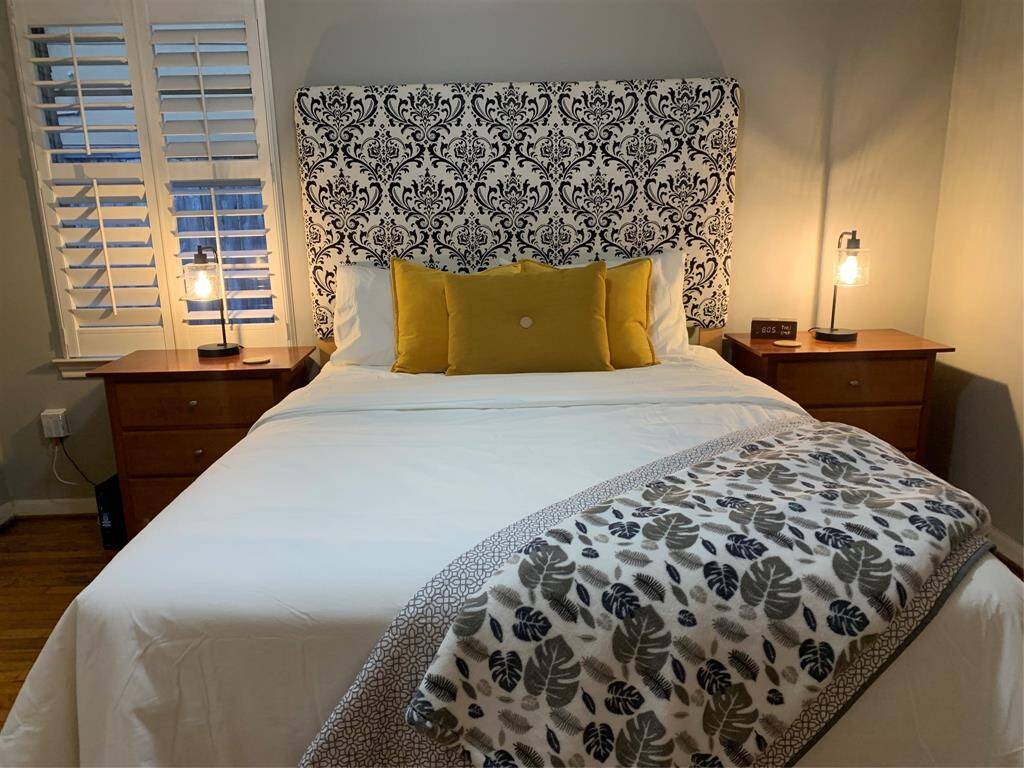 ONE OF THE BEDROOMS FROM FRONT VIEW