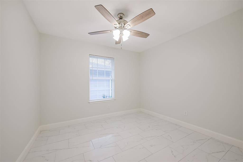 Versatile and spacious, these bedrooms offer fresh updates and plenty of room for family, guests, or a home office.