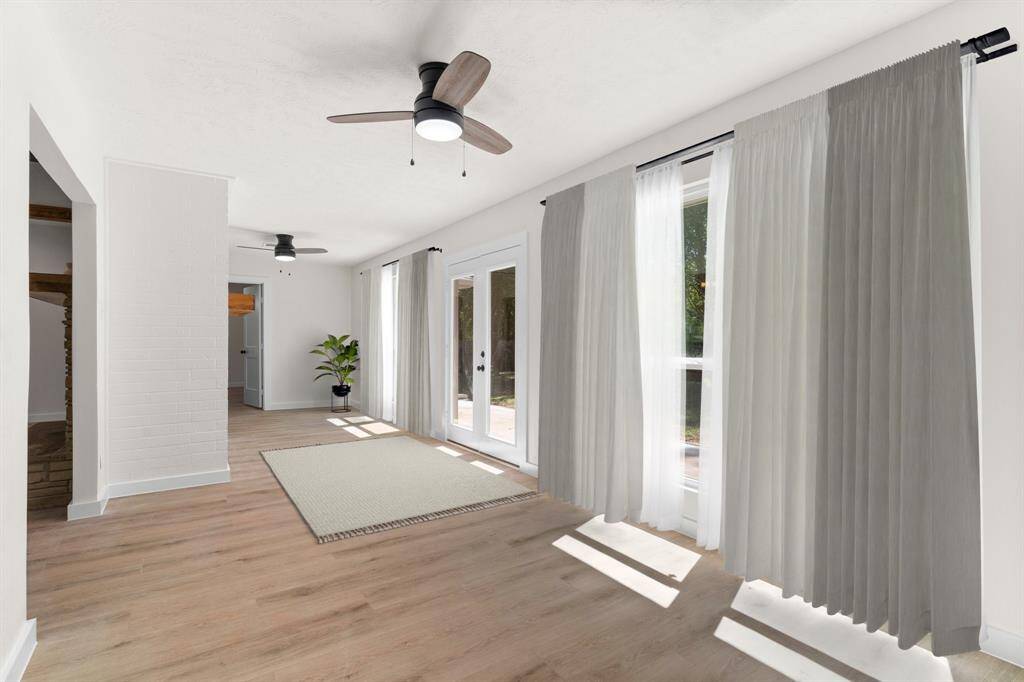 or a gorgeous hallway that has the Primary Bedroom, Living Room and Kitchen access. So many options for this space with beautiful natural lighting and views of wildlife
