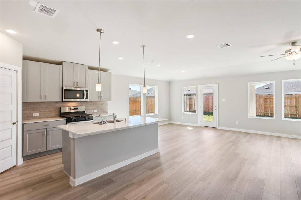 Large Island and PLENTY of gorgeous cabinetry