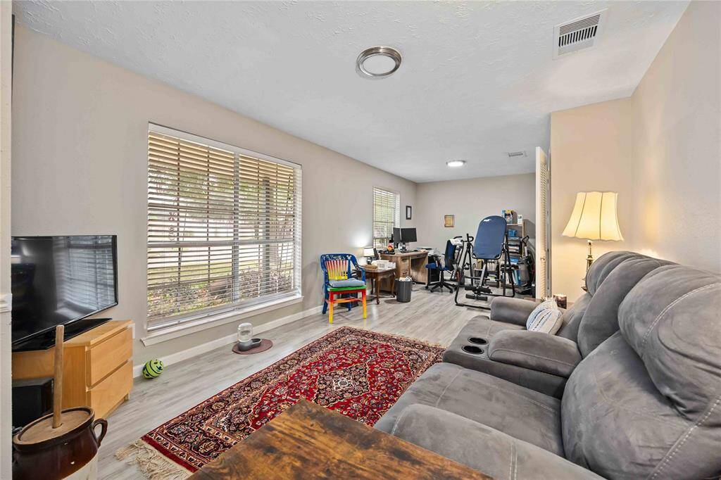 Formal Dining/Living Combo off the kitchen would also work perfectly as an oversized playroom.